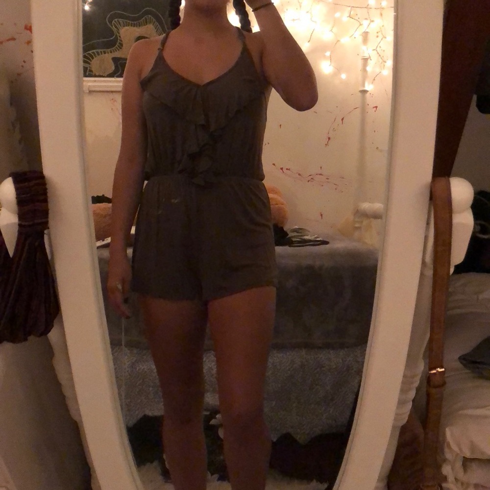 Romper with ruffled chest.